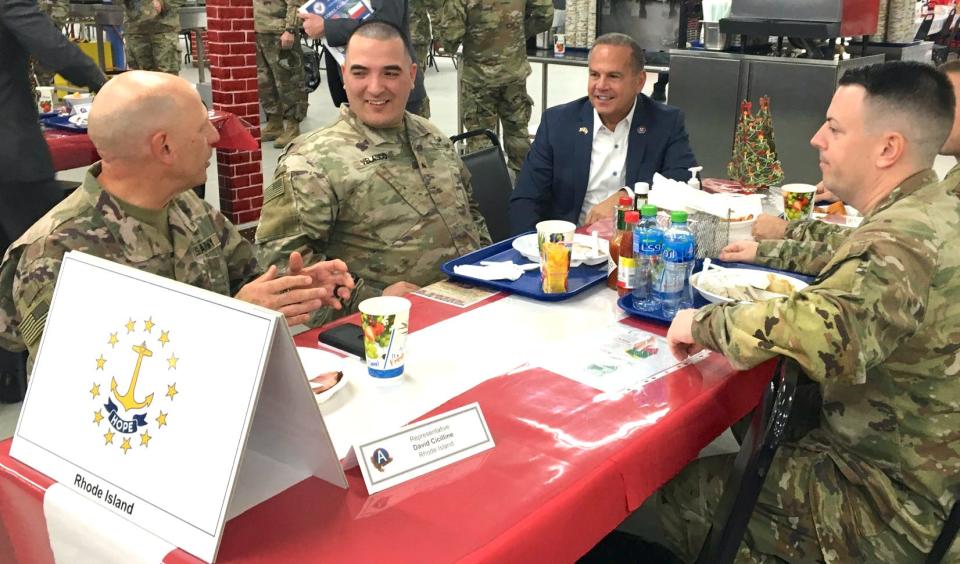 Our elected officials recognize the importance of Christmas to deployed soldiers. In December 2022, U.S. Rep. David Cicilline, second from right, ate Christmas dinner with Rhode Islanders stationed at Camp Arifjan in Kuwait. Keith Curran and Julio Velasco are on the left; Chris Gardiner is on the right. Senators Jack Reed and Sheldon Whitehouse also have given up their holidays to visit with the troops on multiple occasions.