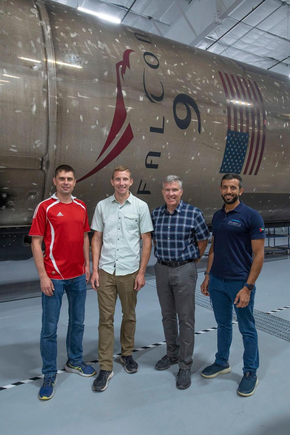 The four crew members that comprise the SpaceX Crew-6 mission pose for a photo inside SpaceX Hangar X at the Kennedy Space Center in Florida.  From left are, Mission Specialist Andrey Fedyaev, Pilot Warren "Woody" Hoburg, Commander Stephen Bowen, and Mission Specialist Sultan Alneyadi.