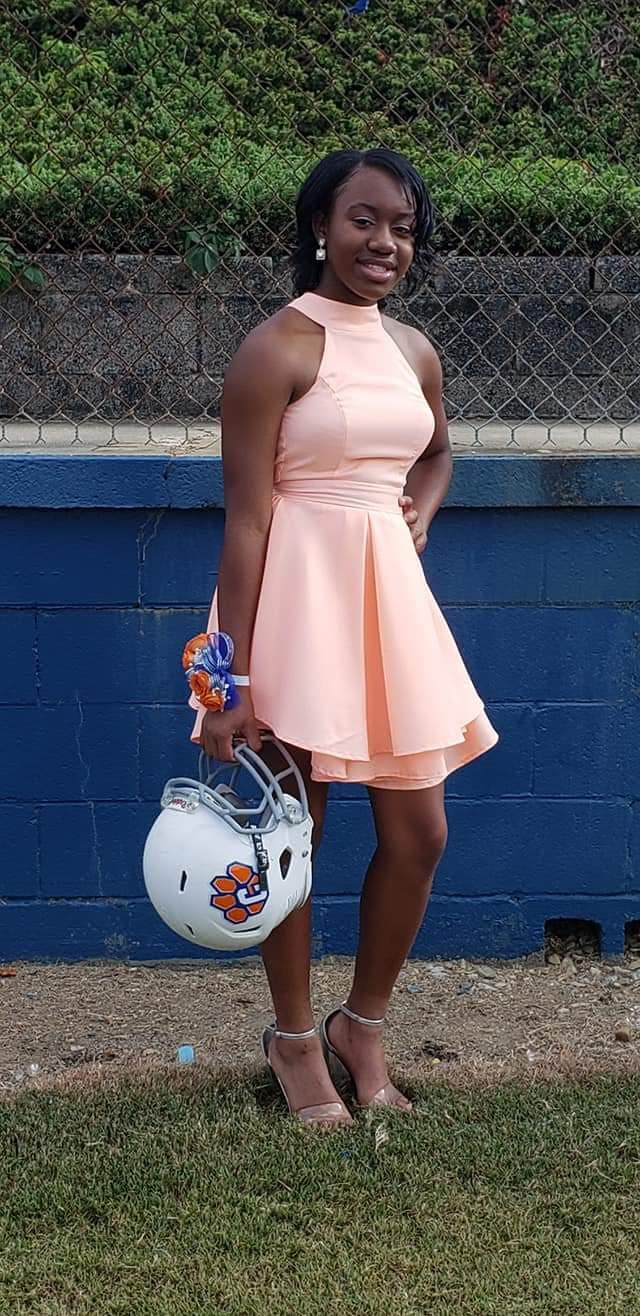 Ta'Mya Bulger, 13, plays both wide receiver and defensive back for her middle school's football team. She was also named Homecoming Queen. (Photo: Tamera Hinton)