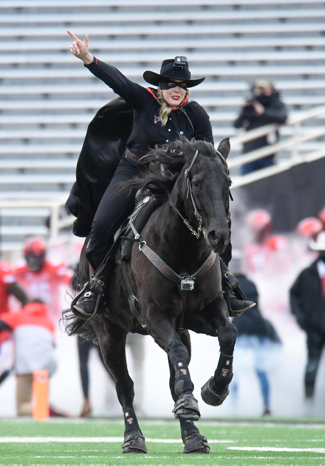 Texas Tech Masked Rider Cameron Hekkert ride out on Fearless Champion before Tech's game against Kansas Saturday, Dec. 5, 2020, at Jones AT&T Stadium in Lubbock, Texas. [Justin Rex/A-J Media]
