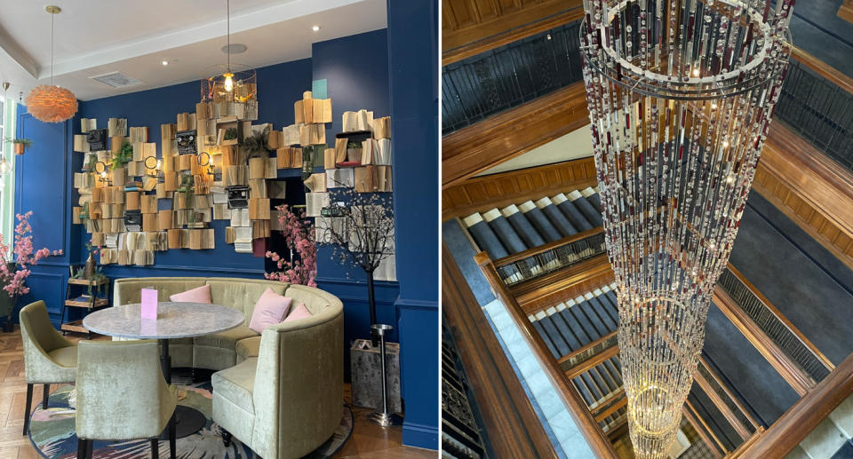 On the left, a luxurious seating area can be seen with books artistically stuck on the wall, while on the right an impressive, bejewelled light drapes down the middle of the hotel's spiral staircase. 