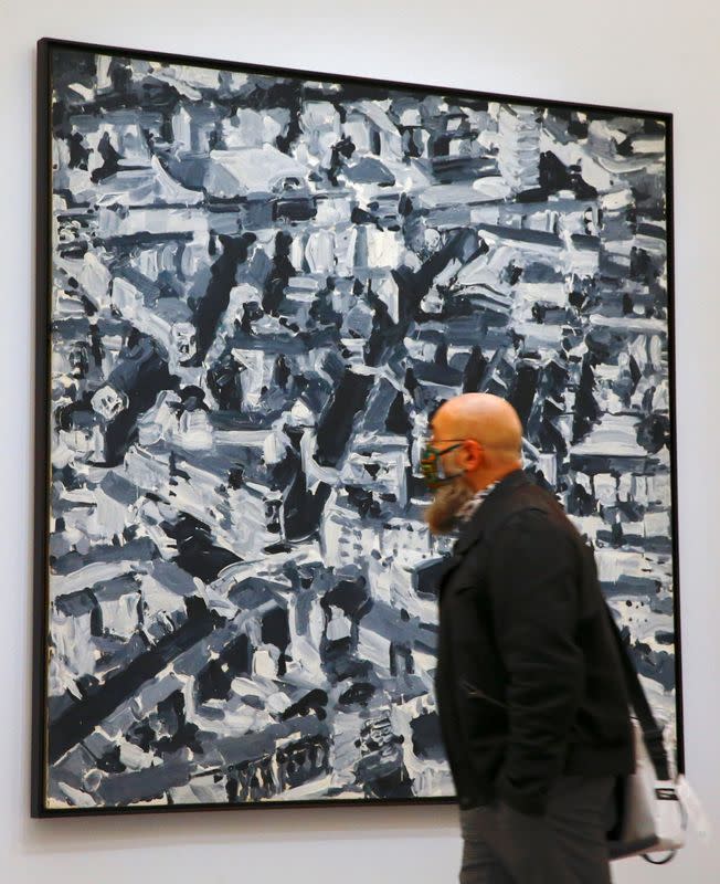 A man looks at the painting "Stadtbild D" by German painter Gerhard Richter at the Kunsthaus Zurich art museum in Zurich