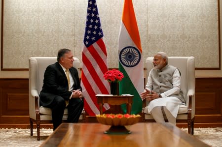 Secretary of State Mike Pompeo, left, talks with Indian Prime Minister Narendra Modi in New Delhi