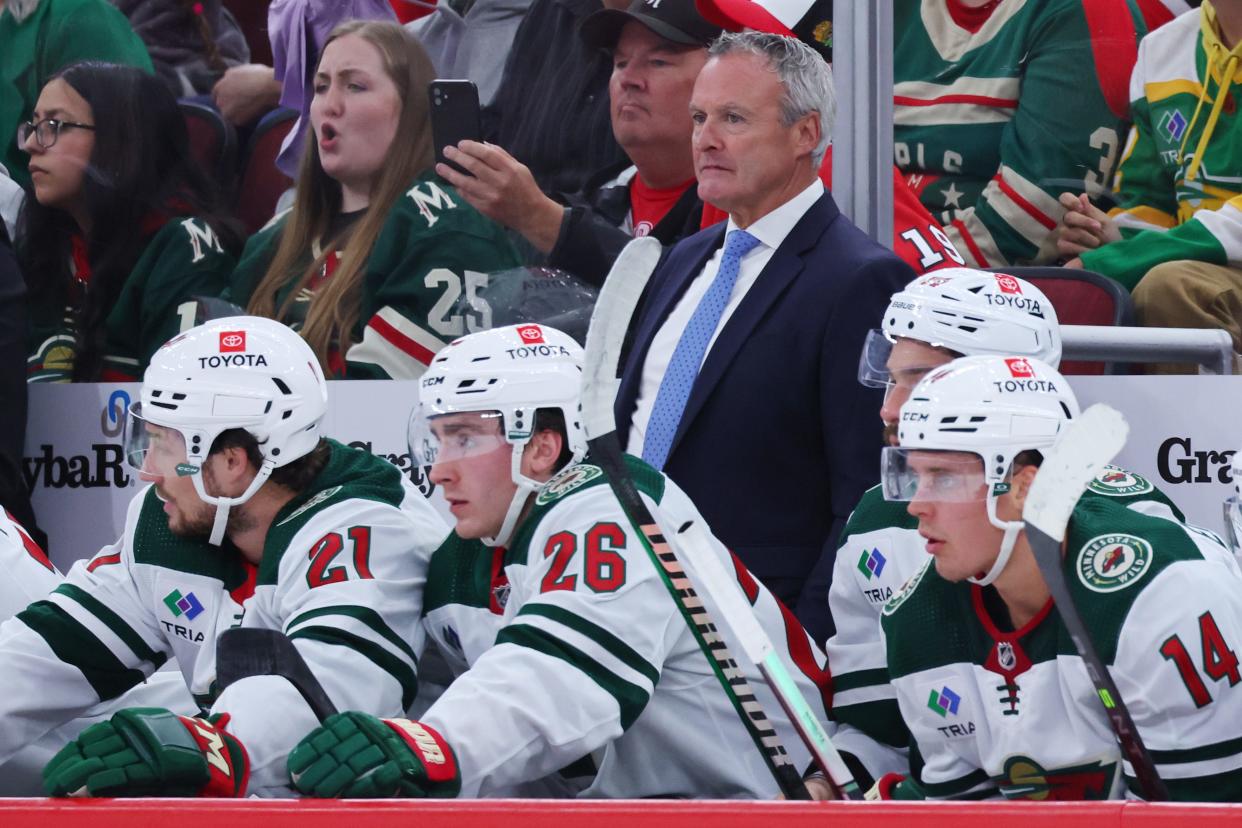 CHICAGO, ILLINOIS - OCTOBER 05: Head coach Dean Evason of the Minnesota Wild looks on against the Chicago Blackhawks during the first period of a preseason game at the United Center on October 05, 2023 in Chicago, Illinois. (Photo by Michael Reaves/Getty Images)