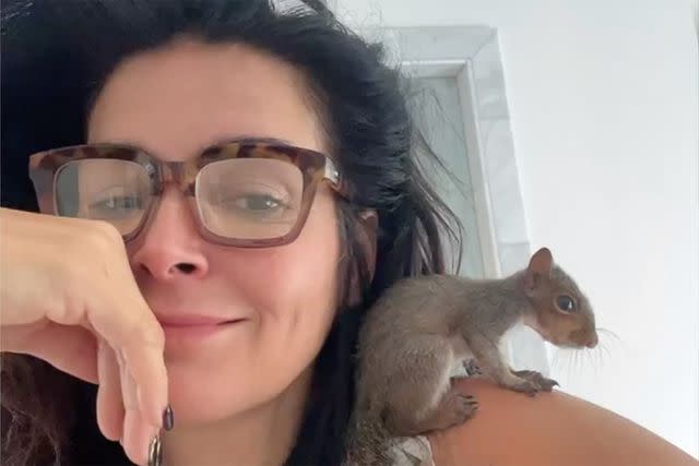 <p>angieharmon/Instagram</p> Angie Harmon with pet squirrel.