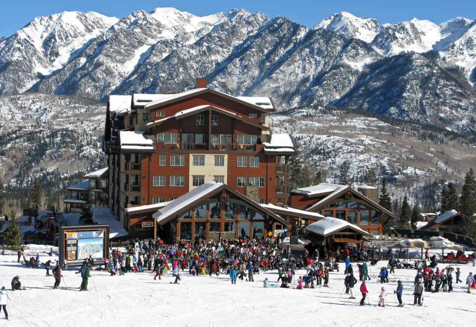 This Jan. 17, 2012 photo provided by Colorado Ski Country USA shows skiers gathered at the lodge at Purgatory Ski Area in Colorado. A disappointing snow year in much of Colorado ski country last season has the state's resorts and hotels hoping that snowboarders and skiers will burn off some pent-up demand for deep snow this winter. (AP Photo/Colorado Ski Country USA/John Trousdale)