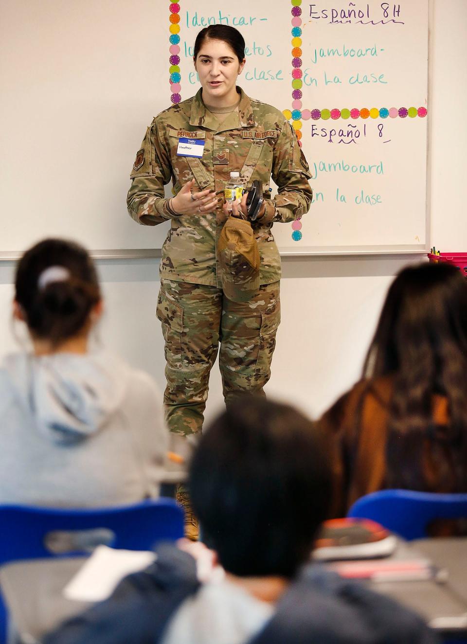 U.S. Air Force military police officer and recruiter Heather Pernock talks with students at Braintree's East Middle School, which celebrated the town's veterans and heard their stories on Thursday, Nov. 10, 2022.