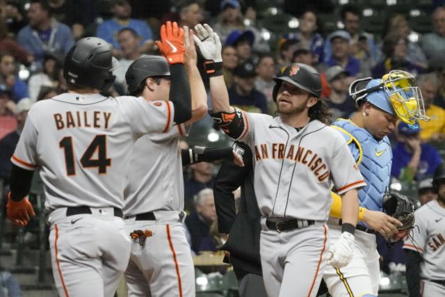 San Francisco Giants' Brett Wisely is congratulated by Casey Schmitt and Patrick Bailey (14) after hitting a three-run home run during the third inning of the team's baseball game against the Milwaukee Brewers Friday, May 26, 2023, in Milwaukee. (AP Photo/Morry Gash)