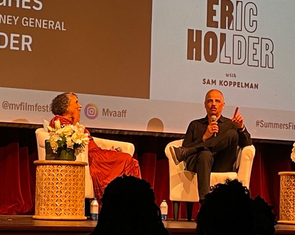 Former U.S. Attorney and author Eric Holder, right, was interviewed about voting rights Thursday night by Cathy Hughes, founder and chairman of Urban One/TV One, as part of the Martha's Vineyard African American Film Festival.