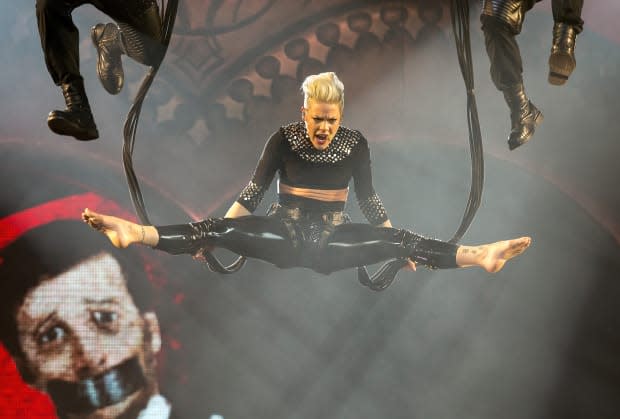 Pink performs in concert during "The Truth About Love" tour at Bankers Life Fieldhouse on Nov. 21, 2013, in Indianapolis.<p><a href="https://www.gettyimages.com/detail/451377067" rel="nofollow noopener" target="_blank" data-ylk="slk:Joey Foley/Getty Images;elm:context_link;itc:0;sec:content-canvas" class="link ">Joey Foley/Getty Images</a></p>