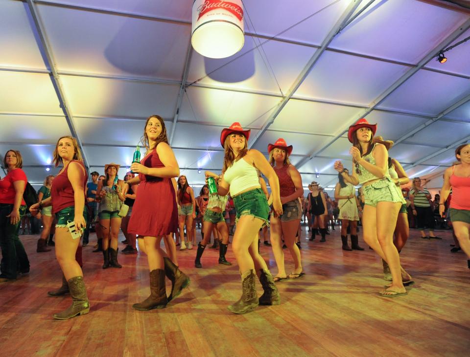 Line dancing in the Harvest Moon dance hall at the Big Barrel Music Festival in Dover in 2015.