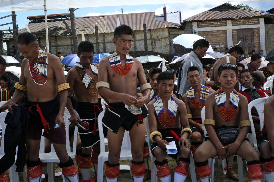 Nagas prepare to leave after celebrations marking the Declaration of their Independence in Chedema, in the northeastern Indian state of Nagaland, Sunday, Aug. 14, 2022. The Nagas - an indigenous people inhabiting several northeastern Indian states and across the border in Myanmar - marked the 75th anniversary of their declaration of independence on Sunday. Seeking self-rule, Nagas had announced independence a day ahead of India's in 1947 and mark this moment every year across northeast states where the Naga community live. (AP Photo/Yirmiyan Arthur)