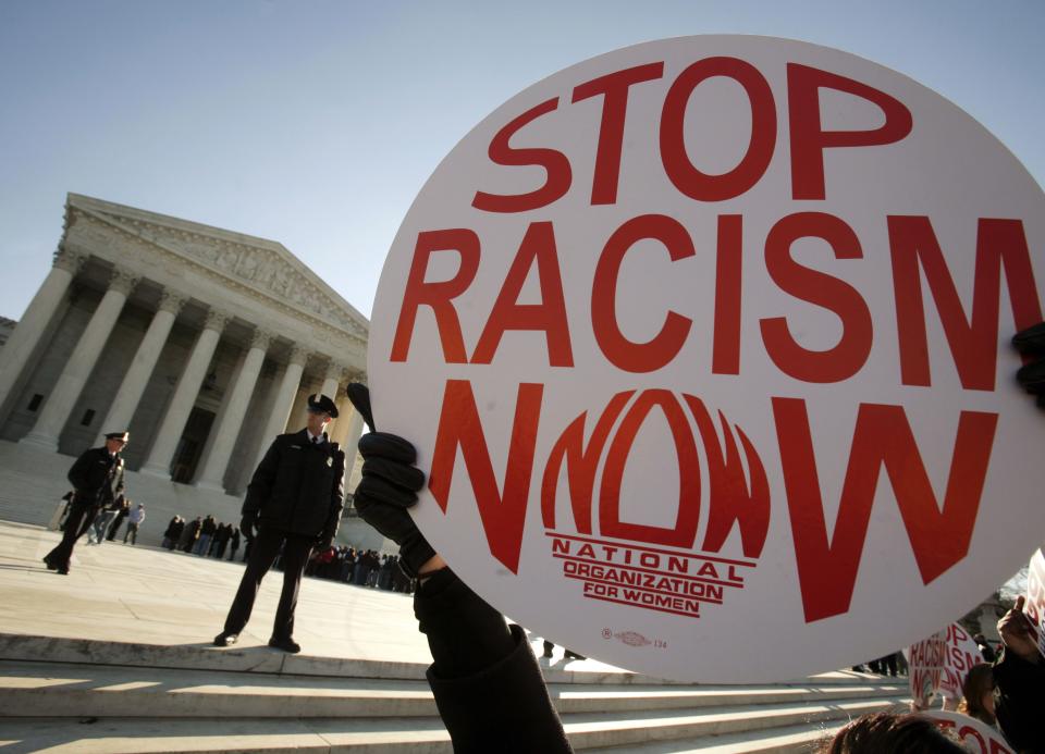 Demonstrators in front of the Supreme Court during the Meredith hearing (Jim Young/Reuters)