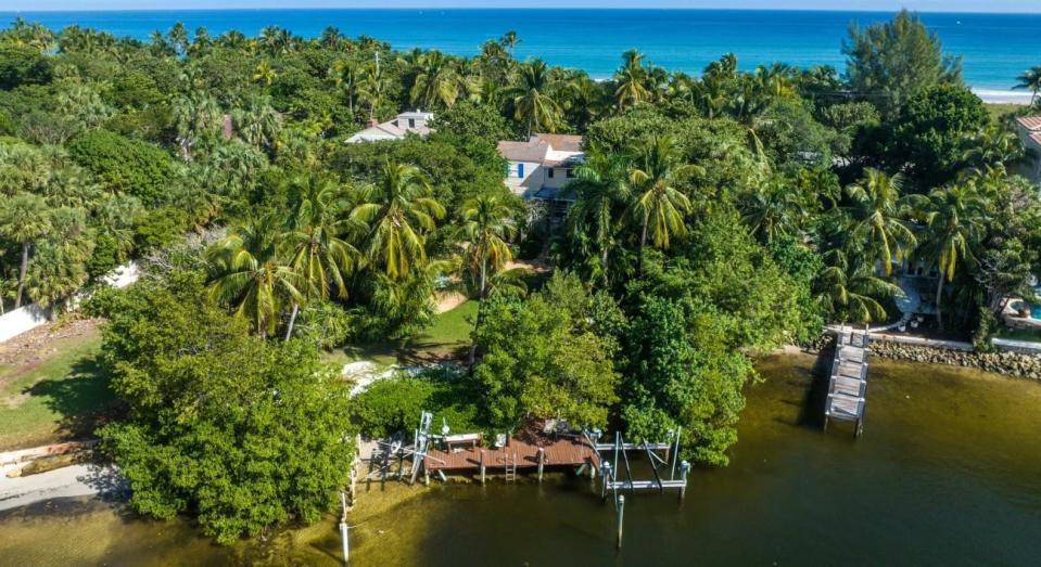 An ocean-to-lake estate at 3060 S. Ocean Blvd in Manalapan, seen here in the center with a brown dock in the Intracoastal Waterway, has sold at a land-value price of $16.5 million.