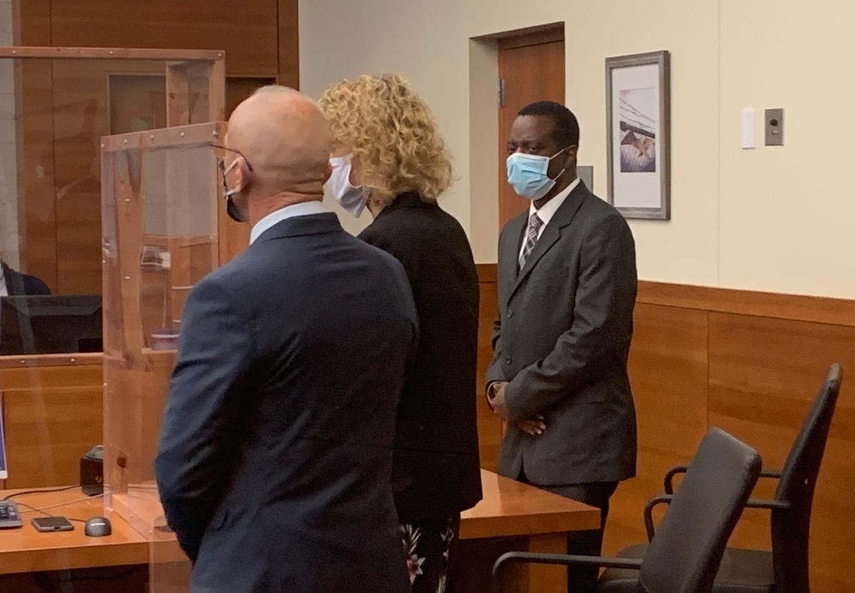 John Clark (right) stands with his lawyers Monday in Franklin County Common Pleas Court, where a jury found him guilty of one count of election falsification, a felony.