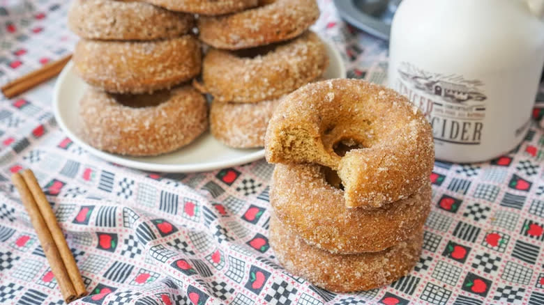 Stack of donuts and cider flagon