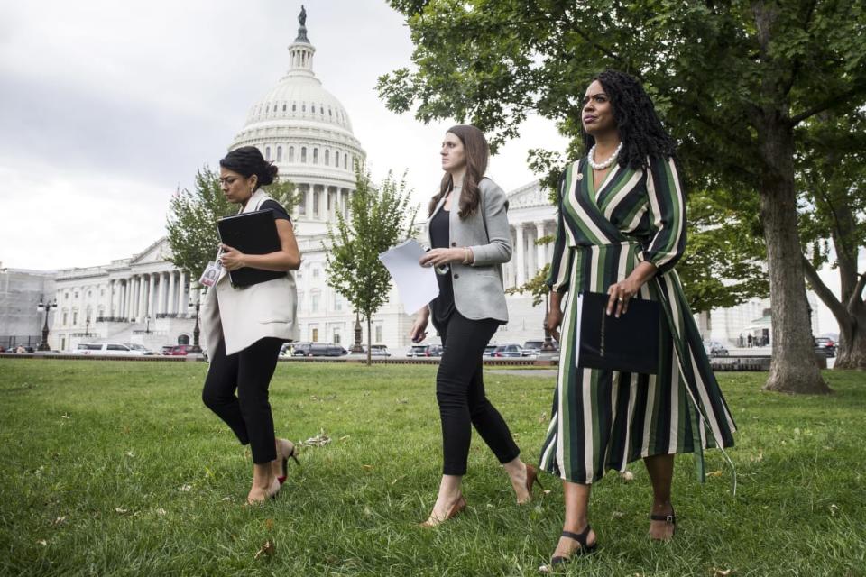 <div class="inline-image__caption"><p>U.S. Rep. Ayanna Pressley (D-MA) (R) arrives before speaking at a rally hosted by Progressive Democrats of America on Capitol Hill on September 26, 2019 in Washington, DC. </p></div> <div class="inline-image__credit">Zach Gibson/Getty</div>