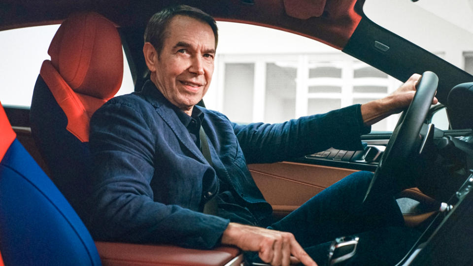 The artist behind the wheel of the extremely limited-edition 8 X Jeff Koons. - Credit: Photo: Courtesy of BMW.