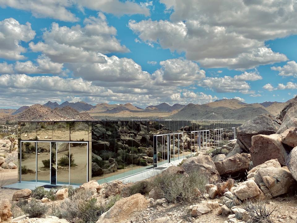 The eastern side of the Invisible House on a cloudy day.