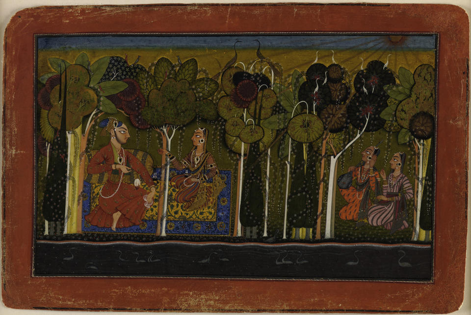 "A Nobleman and His Devoted Wife Seated in the&nbsp;Forest; Two Female Musicians Attend."&nbsp;Illustrated folio probably from an unidentified nayaka-<br />nayika (hero-heroine) series&nbsp;Punjab Hills, kingdom of Basohli, ca. 1685.&nbsp;Opaque watercolor, gold, and applied beetle-wing&nbsp;cases on paper; wide red border with black, silver (now&nbsp;tarnished), and striated white inner rules; black outer&nbsp;rule (missing right corner of folio replaced); painting 6&nbsp;11/16 x 11 in.&nbsp;Promised Gift of the Kronos Collections, 2015.