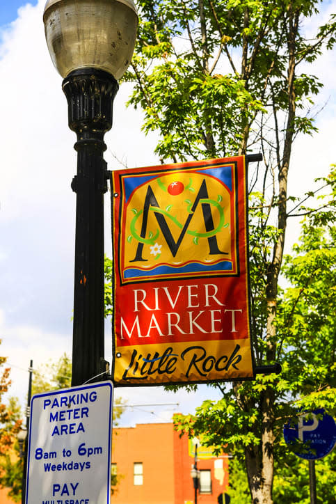 <div class="inline-image__title">506784442</div> <div class="inline-image__caption"><p>"Hanging from a lamp post, a River Market district overhead banner in Little Rock city Arkansas"</p></div> <div class="inline-image__credit">Getty Images</div>