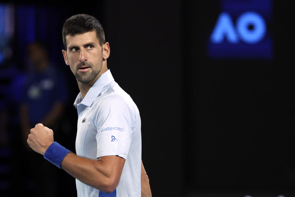 Novak Djokovic of Serbia reacts after defeating Adrian Mannarino of France in their fourth round match at the Australian Open tennis championships at Melbourne Park, Melbourne, Australia, Sunday, Jan. 21, 2024. (AP Photo/Asanka Brendon Ratnayake)