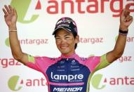 Cycling - Tour de France cycling race - The 190.5 km (118 miles) Stage 6 from Arpajon-sur-Cere to Montauban, France - 07/07/2016 - Lampre-Merida team rider Yukiya Arashiro of Japan reacts on the podium after winning the best combative rider jersey. REUTERS/Juan Medina