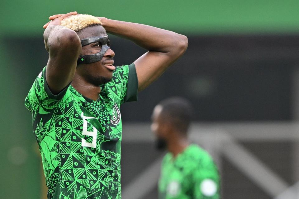 Mixed fortunes: Victor Osimhen scored but missed some key chances for Nigeria in AFCON opener (AFP via Getty Images)