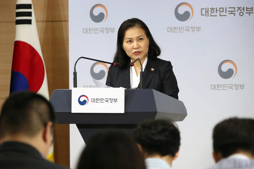 South Korea's senior trade official Yoo Myung-hee speaks during a briefing at a government complex in downtown Seoul, South Korea, Wednesday, Sept. 11, 2019. South Korea is filing a complaint with the World Trade Organization over Japan's tightened export controls on key materials South Korean companies use to make computer chips and displays, accusing Tokyo of weaponizing trade to retaliate over political rows. (Kim Seung-doo/Yonhap via AP)