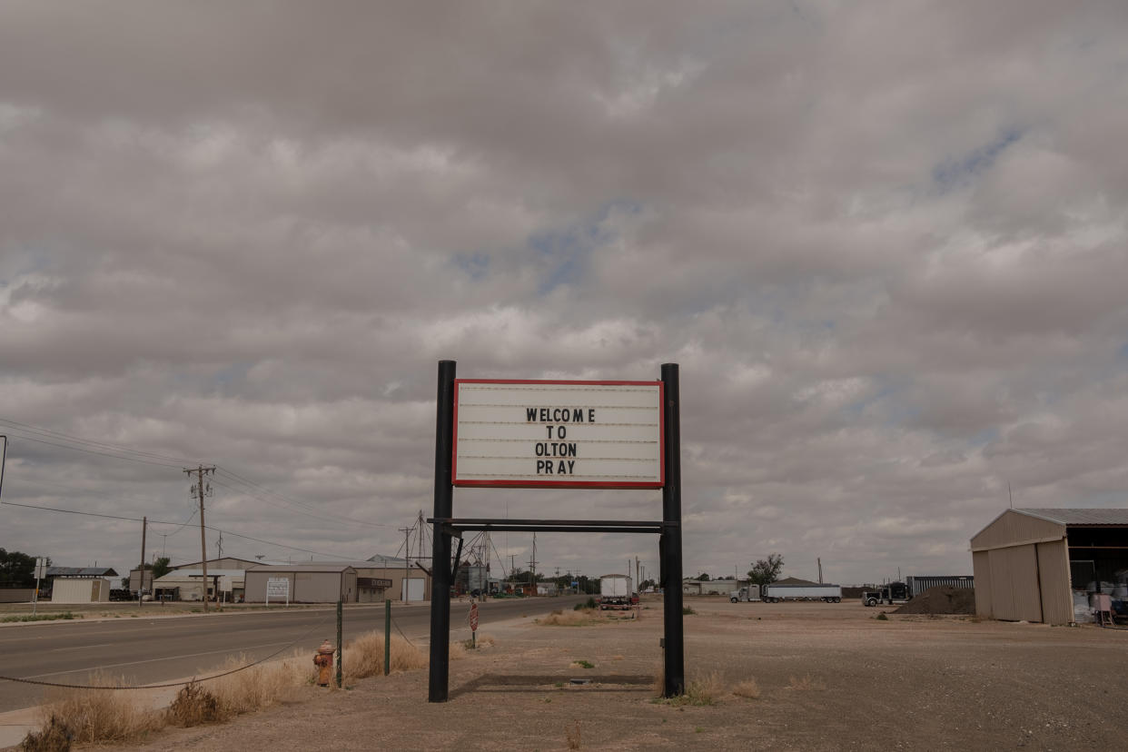 A welcoming sign at Olton urges residents to pray, in Lamb County Texas on June 26, 2022.