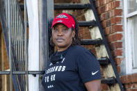 Natasha Blunt poses for a portrait in New Orleans, Friday, July 31, 2020. Blunt owes thousands of dollars in back rent after she lost her banquet porter job. She has yet to receive her stimulus check and has not been approved for unemployment benefits. Her family is getting by with food stamps and the charity of neighbors. (AP Photo/Dorthy Ray)