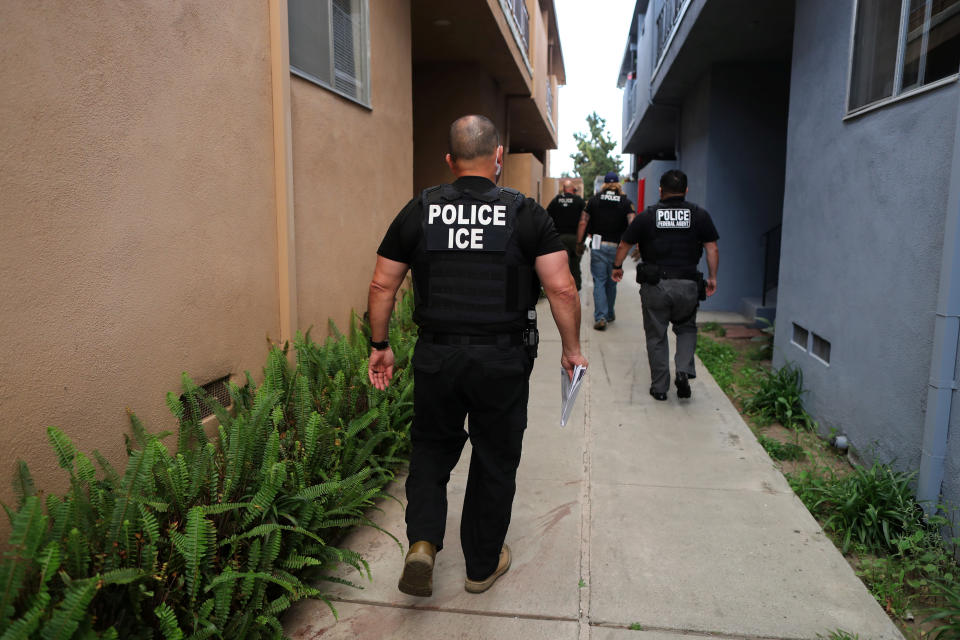 ICE Field Office Director, Enforcement and Removal Operations, David Marin and U.S. Immigration and Customs Enforcement's (ICE) Fugitive Operations team search for a Mexican national at a home in Hawthorne, Calif. on March 1, 2020. (Lucy Nicholson/Reuters)