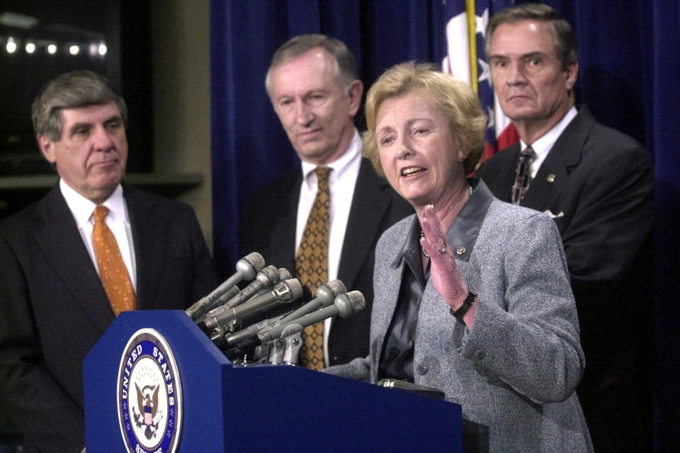 FILE - Sen. Jean Carnahan, D-Mo., second right, gestures during a Capitol Hill news conference Wednesday, April 4, 2001 to discuss the budget. From left are, Sen. Ben Nelson, D-Neb., Sen. James Jeffords, R-Vt., Carnahan and Sen. John Breaux, D-La. Carnahan, who became the first female senator to represent Missouri after she was appointed to replace her husband following his death, died Tuesday, Jan. 30, 2024. She was 90. (AP Photo/Stephen J. Boitano, File)