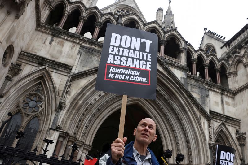 FILE PHOTO: Supporters of WikiLeaks founder Julian Assange protest in London