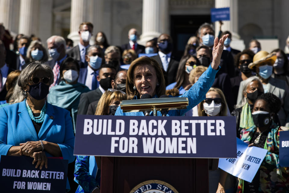 U.S. House Speaker Nancy Pelosi, a Democrat from California, center, speaks during a 