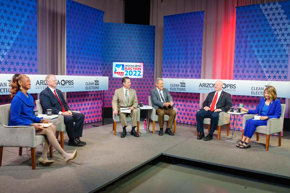 Arizona Corporation Commission candidates and moderators prepare for debate at the PBS studio at ASU's Cronkite School of Journalism on Sep 12, 2022, in Phoenix. Left to right: Sandra Kennedy, Nick Myers, Richard Ruelas, Ted Simons, Kevin Thompson and Lauren Kuby.