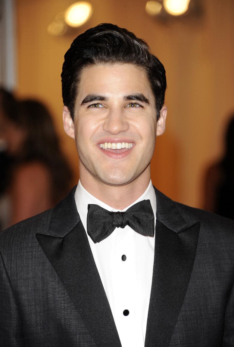 Darren Criss arrives at the Metropolitan Museum of Art Costume Institute gala benefit, celebrating Elsa Schiaparelli and Miuccia Prada, Monday, May 7, 2012 in New York. (AP Photo/Evan Agostini)