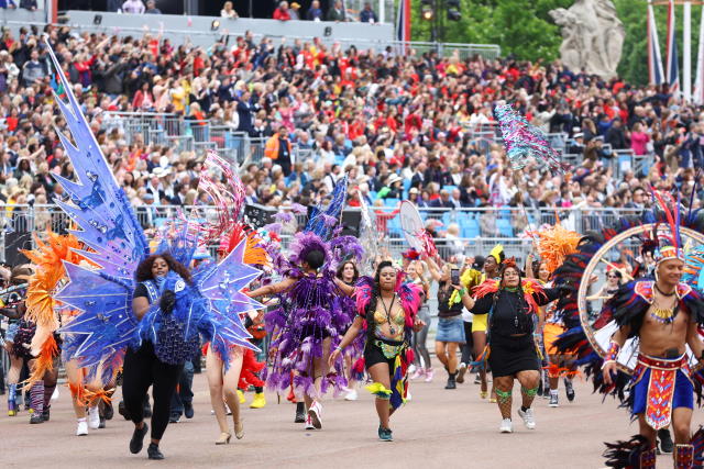 London UK, 5th June 2022. woman street dancer at The pageant for the Queen  Elizabeth II's Platinum Jubilee celebration in central London. Large Crowds  line the street along the Mall and Whitehall