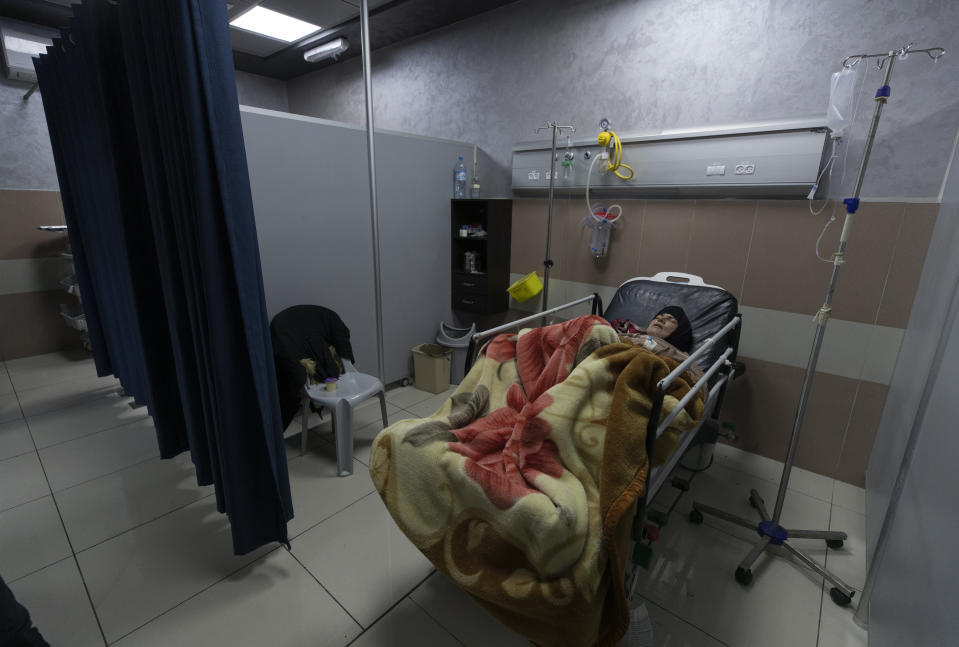 A Palestinian patient infected with COVID-19 lies under medical observation at the emergency unit, in the Palestine Medical Complex, in the West Bank city of Ramallah, Thursday, Jan. 28, 2021. (AP Photo/Nasser Nasser)