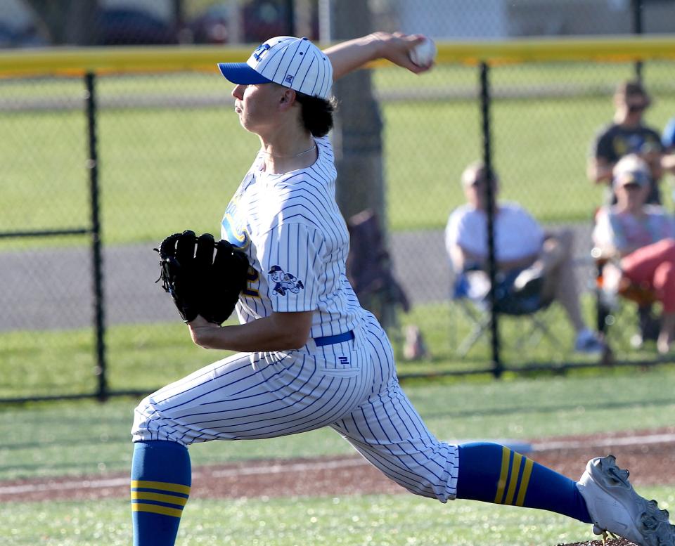 Mitchell's Kody Earl (12) hurls a pitch on Wednesday, April 17, 2024.