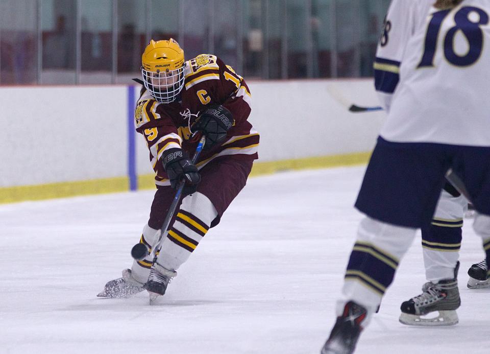 Weymouth's Mairead O'Connell shoots the puck during a game against Archbishop Williams at Canton Sportsplex on Wednesday, January 19, 2022.