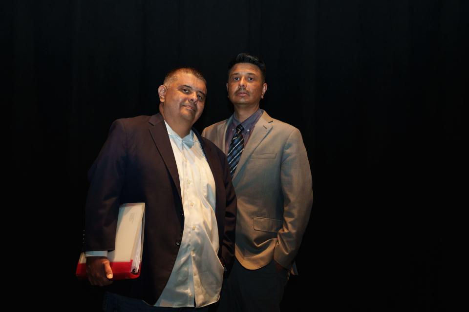 Brothers and collaborators, Claude (left) and Roberto Jackson pose for a portrait at Wild Horse Pass Casino on Dec. 29, 2022, in Chandler. Claude holds a copy of a play he wrote, which will premiere in January 2023 at the San Francisco Playhouse.