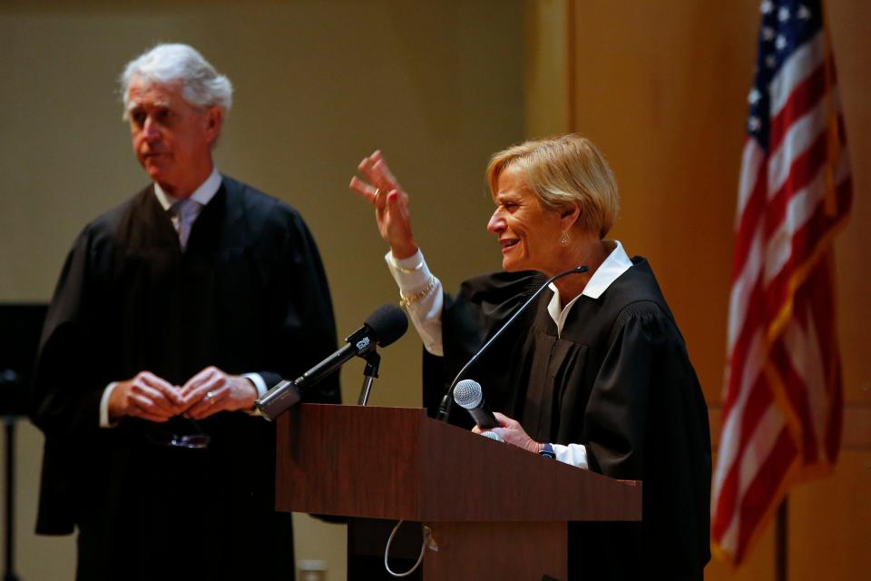 Chief Justice Mark Green and his wife, retired Associate Justice Karen Green, speak with Keith Middle School students on how the judicial system works, as part of Judicial Outreach Month.