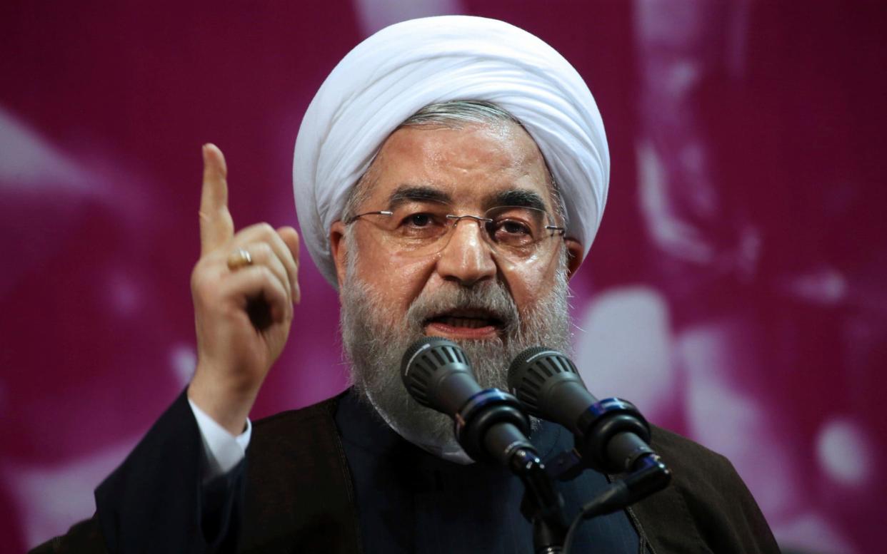 Hassan Rouhani won a decisive 57 per cent of the vote over his hardline opponent - AP