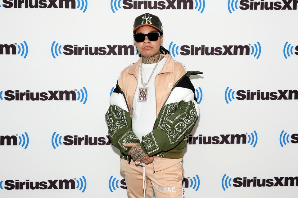 Young M.A. Wearing A Coat And A Jacket