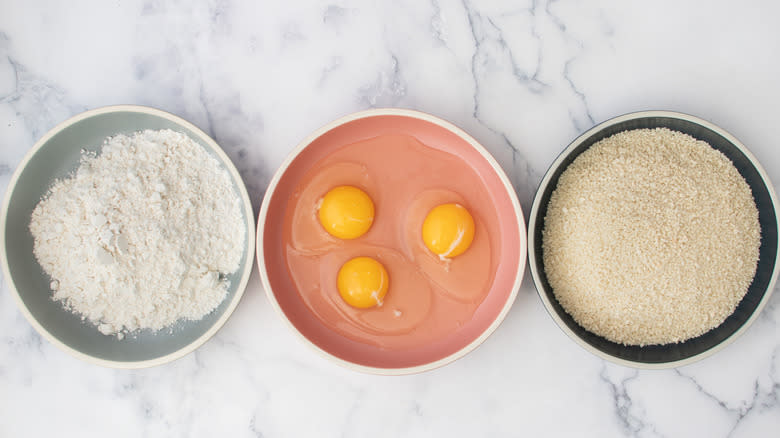 flour eggs breadcrumbs in bowls