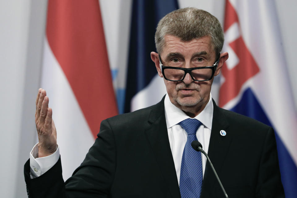 FILE - Czech Republic's Prime Minister Andrej Babis gestures during joint statements with French President Emmanuel Macron, Hungarian Prime Minister Viktor Orban, Poland's Prime Minister Mateusz Morawiecki and Slovakia's Prime Minister Eduard Heger after a meeting of central Europe's informal body of cooperation called the Visegrad Group or V4, in Budapest, Hungary, Monday, Dec. 13, 2021. Former Czech Prime Minister Andrej Babis went on trial on Monday, Sept. 12, 2022 after the prosecution indicted him in a $2 million fraud case involving European Union subsidies. (AP Photo/Laszlo Balogh, File)