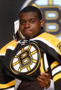 PITTSBURGH, PA - JUNE 22: Malcolm Subban, 24th overall pick by the Boston Bruins, cries as he puts on his jersey during Round One of the 2012 NHL Entry Draft at Consol Energy Center on June 22, 2012 in Pittsburgh, Pennsylvania. (Photo by Bruce Bennett/Getty Images)