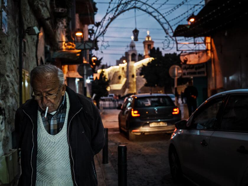 A man walks through the Old City near the Church of Nativity in Bethlehem.