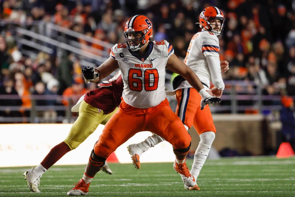 Syracuse offensive lineman Matthew Bergeron (60) blocks against Boston College during a November college football game. Bergeron is among several linemen who could be attractive to the Jaguars in the 2023 NFL Draft.